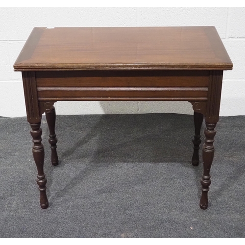 156 - Victorian mahogany games table on turned legs with swivel top and storage compartment 30