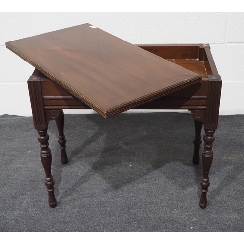 156 - Victorian mahogany games table on turned legs with swivel top and storage compartment 30