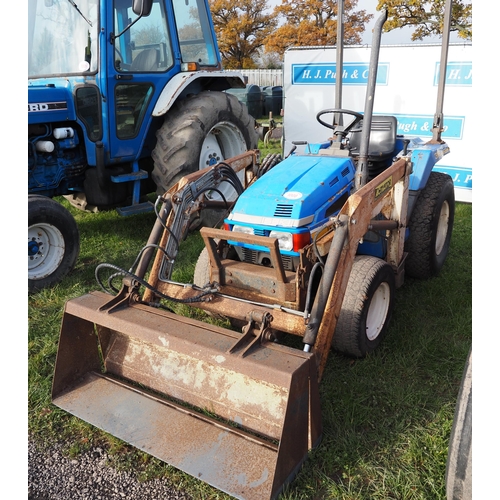 1008 - Iseki 318 compact tractor with loader and roll bar. Runs and drives