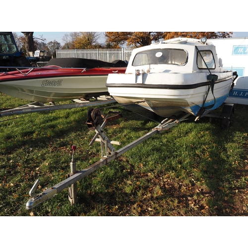 1124 - Dory boat on trailer