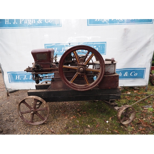 93 - Amanco 4hp open crank stationary engine on 4 wheel trolley. S/n 410105. Comes with original starting... 