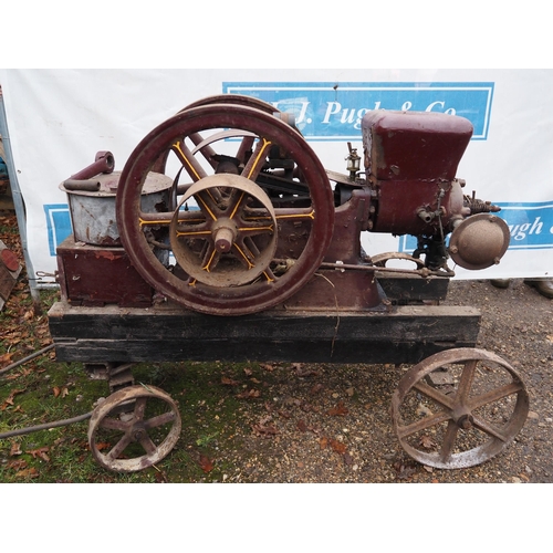 93 - Amanco 4hp open crank stationary engine on 4 wheel trolley. S/n 410105. Comes with original starting... 