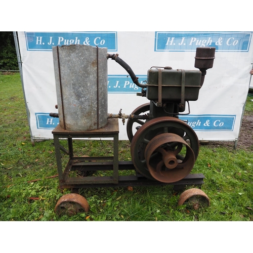 99 - Lister single cylinder 6hp stationary engine on 4 wheel trolley. S/n 7618512. Was running when store... 