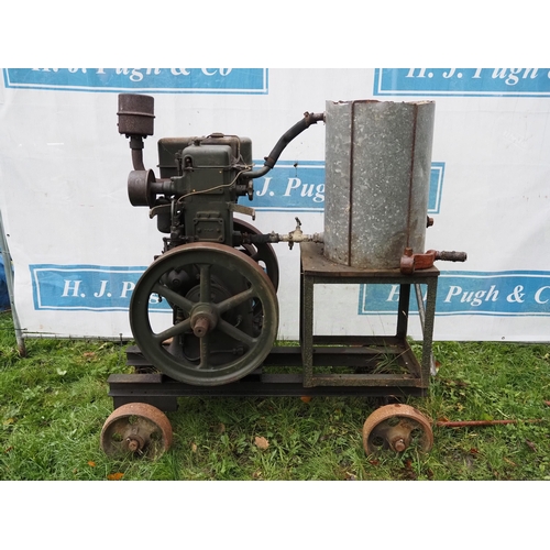 99 - Lister single cylinder 6hp stationary engine on 4 wheel trolley. S/n 7618512. Was running when store... 