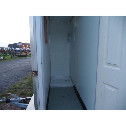 1474 - Twin axle towable double shower unit with on board water tank.