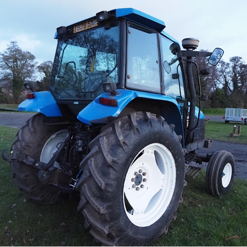 1488 - New Holland TS90 tractor. 1999. 2WD. Runs and drives, good tyres. showing 7298 hours. Log book state... 