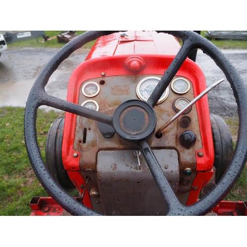 1489 - Massey Ferguson 188 tractor. Import. Fitted with inner and outer wheel weights. Runs and drives. sho... 