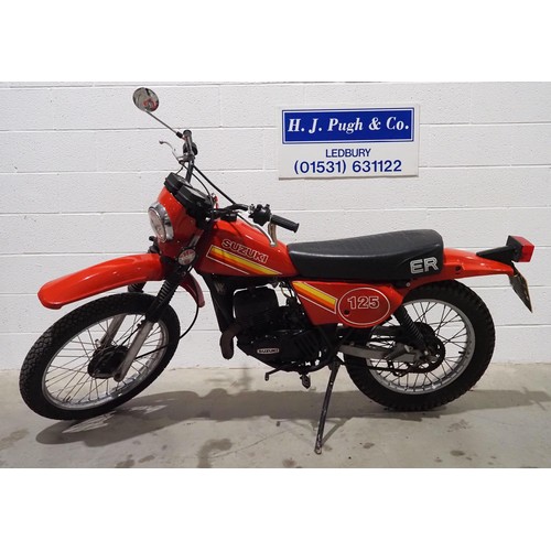856 - Suzuki TS125ER enduro motorcycle. 1980. 124cc.
Frame No. 319954.
Engine No. 184731.
Runs and rides.
... 
