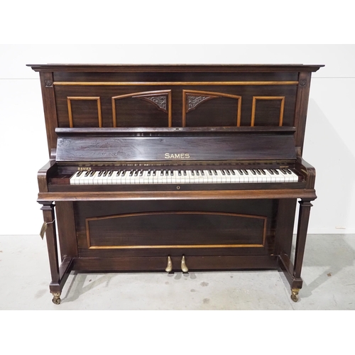 236 - Sames mahogany upright piano on brass casters