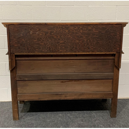 242 - Oak carved sideboard with brass drop handles, drawers, cupboards and keys 53