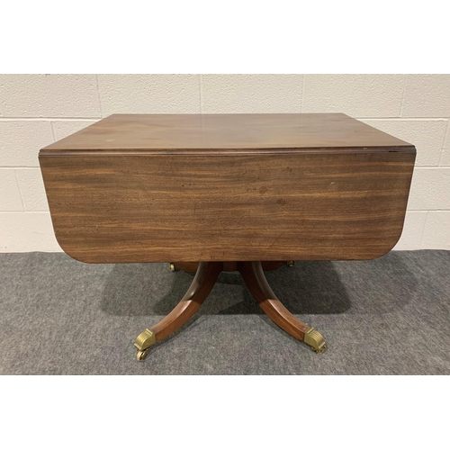 264 - Oak drop leaf table with 1 drawer, 1 false drawer on pedestal base with brass casters 38