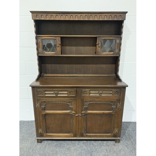 268 - Oak carved dresser with drawers and glazed cupboards 72