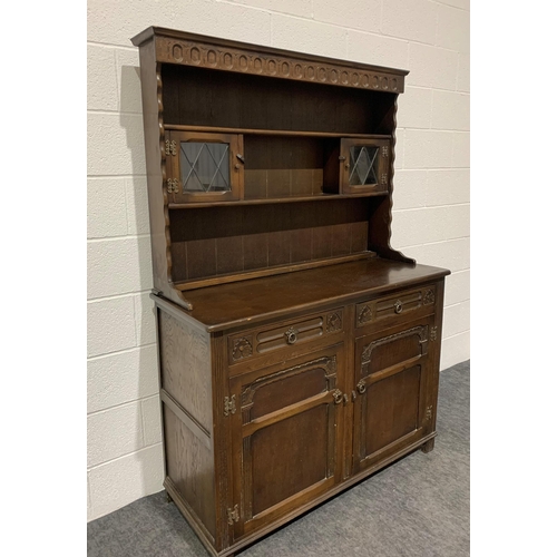 268 - Oak carved dresser with drawers and glazed cupboards 72