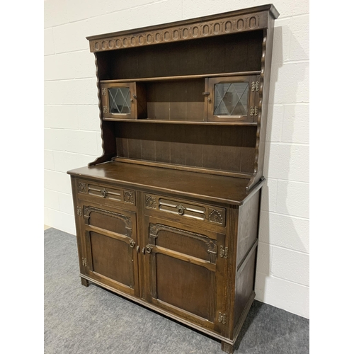 268 - Oak carved dresser with drawers and glazed cupboards 72