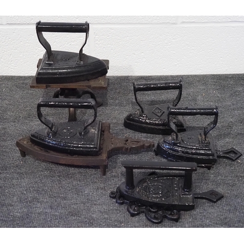 201 - Vintage irons and iron stands