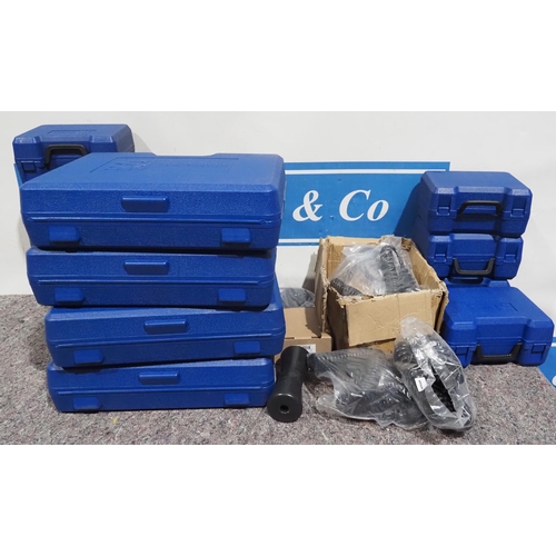 706 - Large quantity of plastic carrying cases, trailer cables, etc.