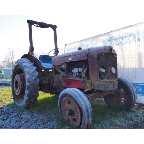 1394 - Fordson Super Major tractor c/w rear wheel weights and roll bar. Good restoration project