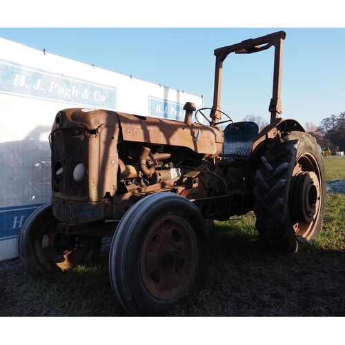 1394 - Fordson Super Major tractor c/w rear wheel weights and roll bar. Good restoration project