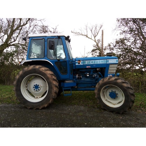 1023 - Ford 8210 4wd tractor. 1980s. Dual power, 4 spools, load monitor, pick up hitch and assister ram. En... 