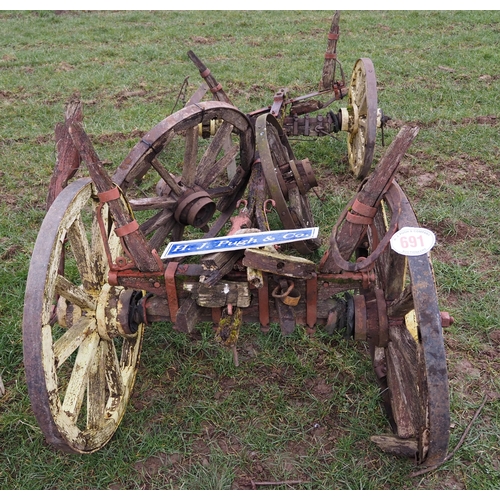 691 - 19th Century wooden cart and spare wheels