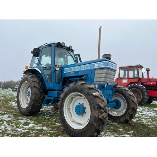 1023 - Ford 8210 4wd tractor. 1980s. Dual power, 4 spools, load monitor, pick up hitch and assister ram. En... 