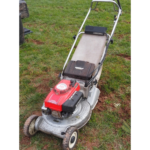 245 - Honda mower. Key in office