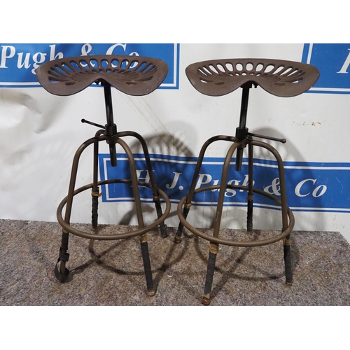 627 - Pair of tractor seat stools