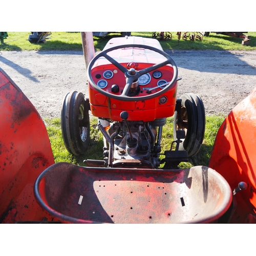 1399 - Massey Ferguson 135 tractor. Runs and drives. Showing 9418 hours. Reg. VYB 397B