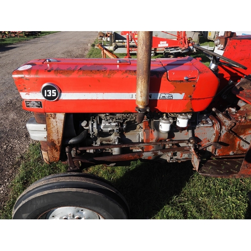 1399 - Massey Ferguson 135 tractor. Runs and drives. Showing 9418 hours. Reg. VYB 397B