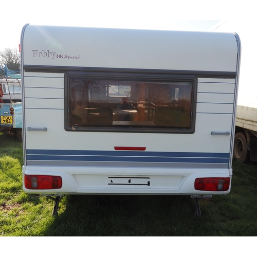 1479 - Hobby exclusive 20ft twin axle 6 berth caravan. Manufactured with no toilet and no shower, king size... 