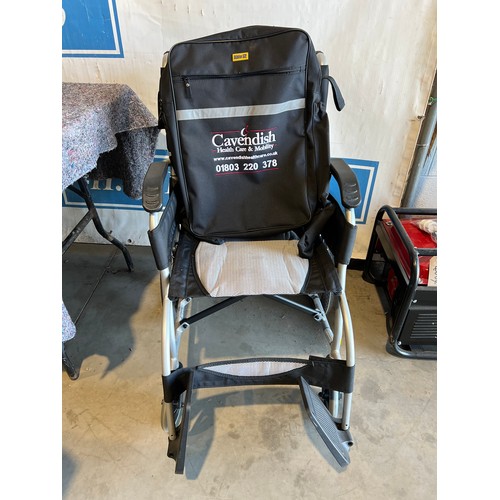 718 - Karma wheel chair. Brand new c/w Cavendish bag