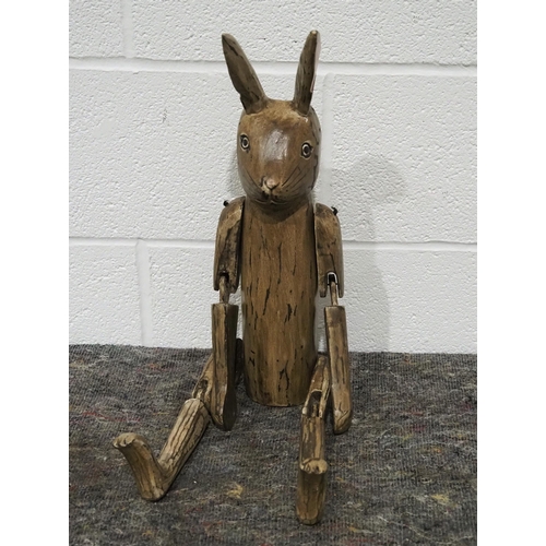 311 - Wooden sitting rabbit with puppet type arms and legs 28