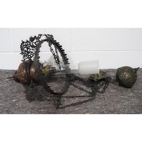 316 - Ornate hanging oil lamp complete with chimney