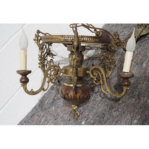 340 - Brass and wood ornate hanging light fitting