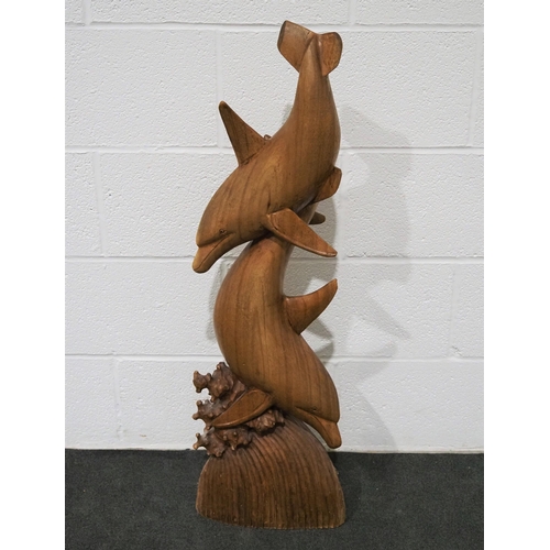 81 - Carved wooden sculpture of 2 diving dolphins 39