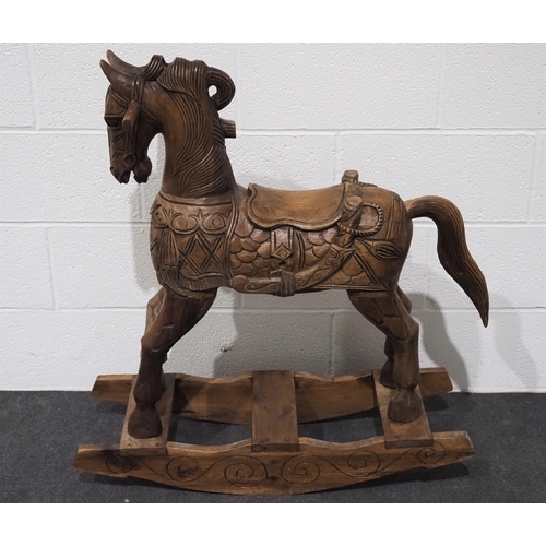 90 - Small carved wooden rocking horse