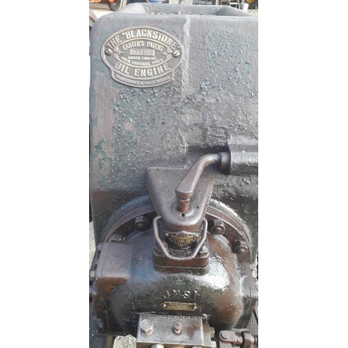 1408 - Blackstone JHSI spring injection engine, 10HP. Original condition, on trolley. Runs c/w exhaust pot