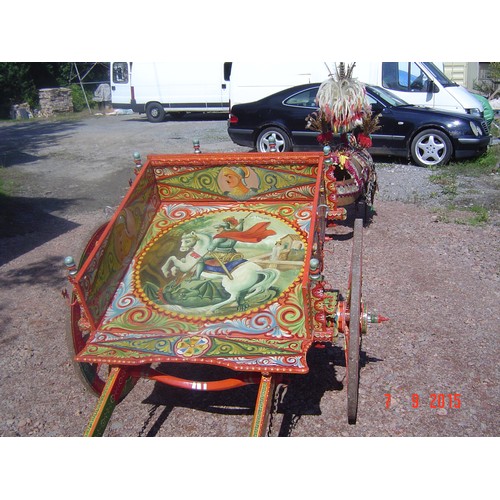 1368 - Sicilian Cantania donkey cart. This beautifully carved and hand painted cart was made circa 1970 by ... 