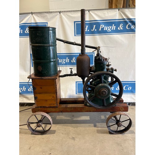 1434D - Petter 2 stroke oil engine on trolley 5hp. In good working order