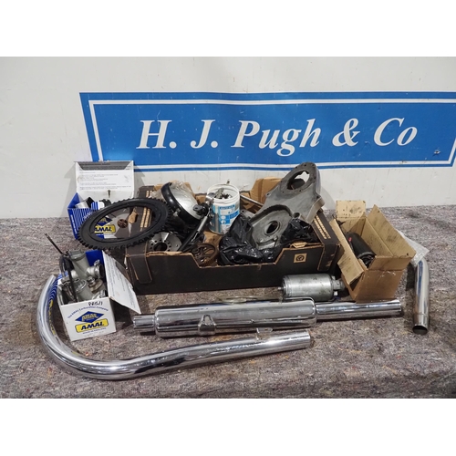 763 - Box of assorted Vincent parts to include exhaust system, carburettors, etc.