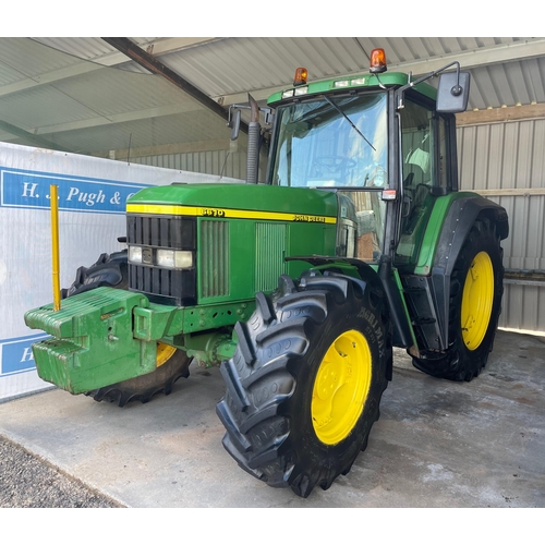 113 - John Deere 6610 4wd tractor. 1998. Runs and drives. 12,500 hours showing. Fitted with front weights.... 