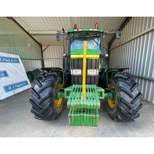 113 - John Deere 6610 4wd tractor. 1998. Runs and drives. 12,500 hours showing. Fitted with front weights.... 