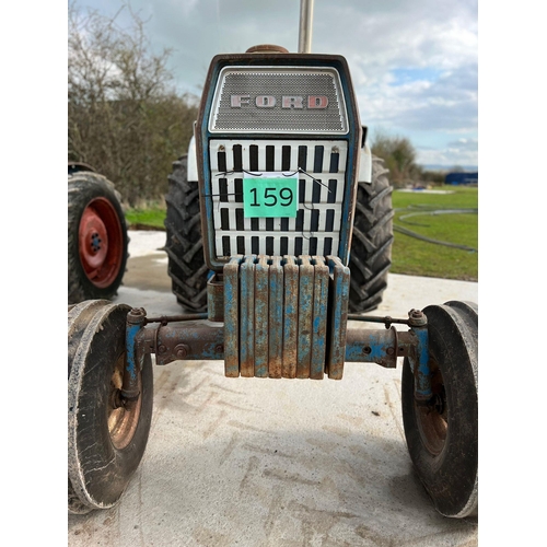 187 - Ford 8000 tractor. American import, 1980's. Showing 5941 hours. Ford front weights, runner