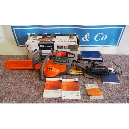 659 - Husqvarna 120i electric chainsaw and manuals etc.
