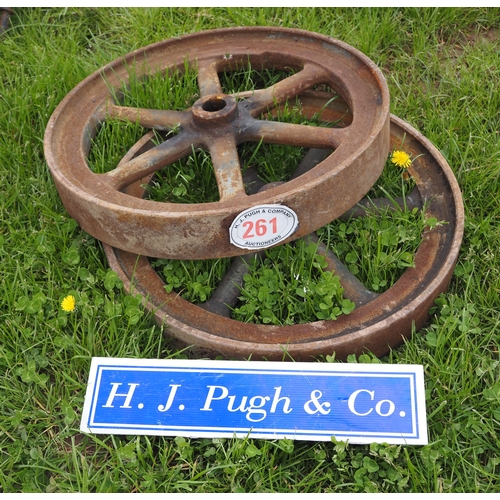 261 - Pair of heavy duty cast iron wheels