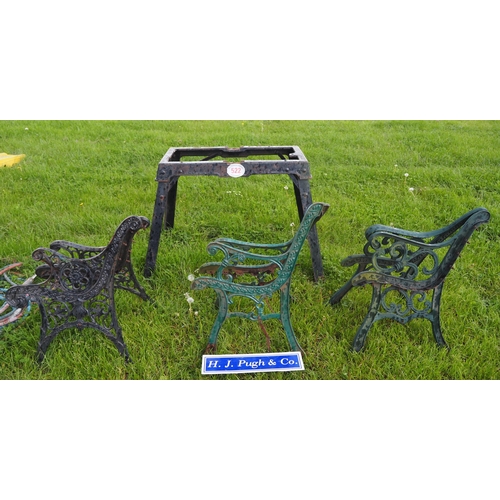 522 - Cast iron trailer base and 3 pairs of bench ends