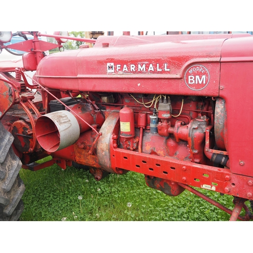 1421 - Farmall model BM tractor with wheel weights. Starts and drives. Serial Number B5740. Reg. RPW 831