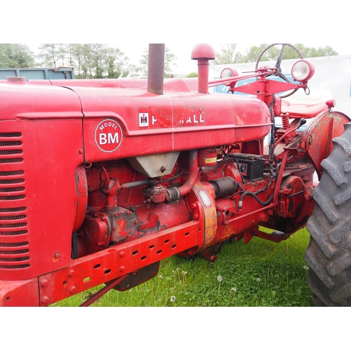 1421 - Farmall model BM tractor with wheel weights. Starts and drives. Serial Number B5740. Reg. RPW 831