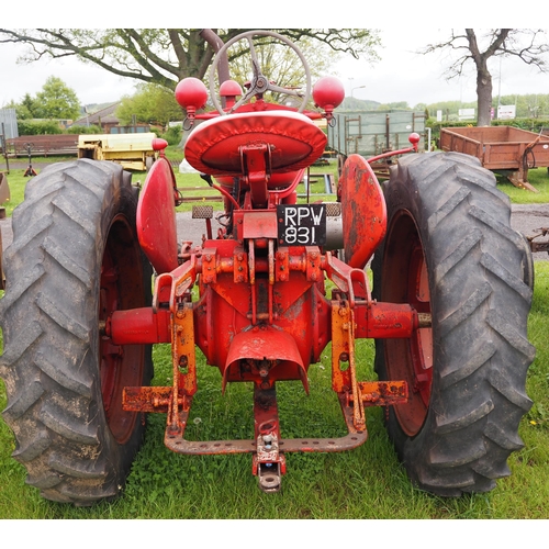 1421 - Farmall model BM tractor with wheel weights. Starts and drives. Serial Number B5740. Reg. RPW 831