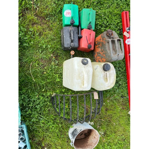 597 - Cast iron hay rack, galvanised bucket, jerry can etc
